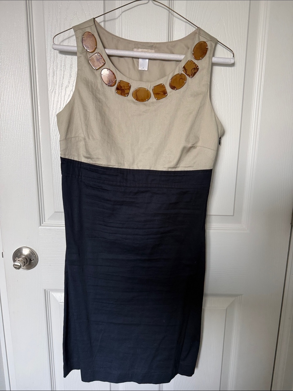 Sleeveless Two-Tone navy and khaki shift Dress with tortoise shell necklinAccent